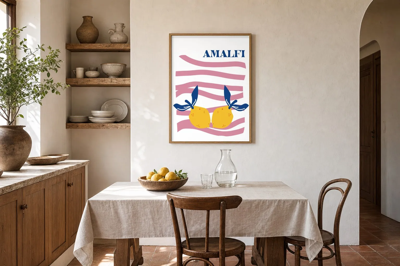 Affiche citrons d'Amalfi encadrée au-dessus d'une table de cuisine
